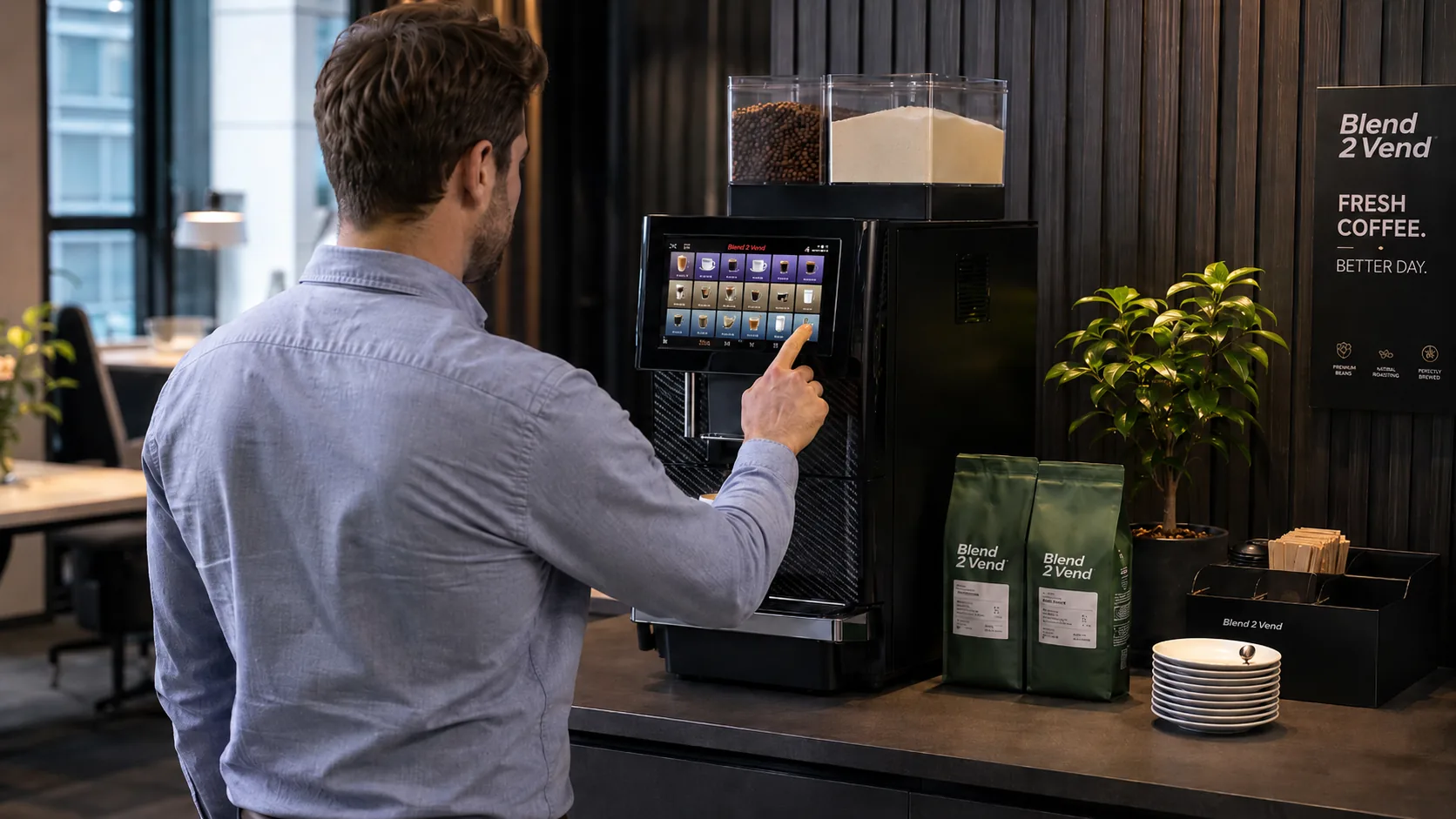 A team member using a Blend 2 Vend bean-to-cup coffee machine in a modern office as part of a fully managed service
